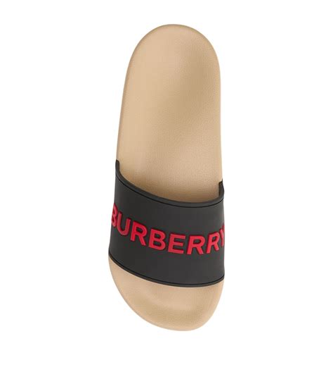 burberry embossed logo slides.